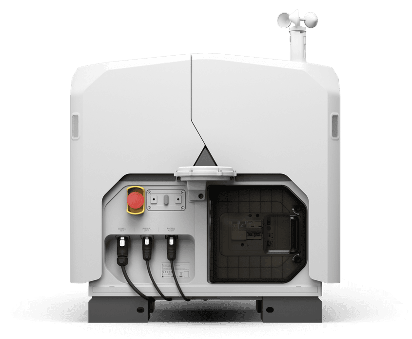 En DJI Dock 3 med kablar och en kontrollpanel synlig på framsidan, designad för teknisk användning.